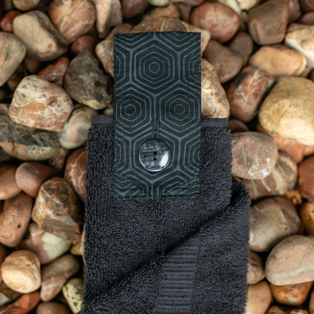 Jett black hanging hand towel. Made using the whole premium hand towel and quality cotton tab sewn to make a loop and secured with a beautiful modern button.