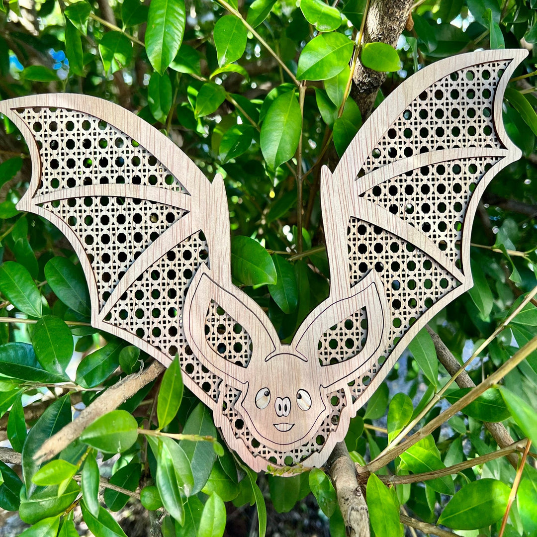 Bat rattan layered wall art.